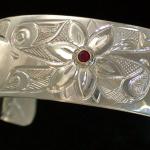 View the image: Hummingbird Flower with Ruby