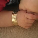 View the image: 14k gold baby bracelet $1350.00