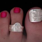 View the image: Toe nails and toe ring