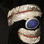 View the image: Silver feather wrap copper vein, Opal size 6.5